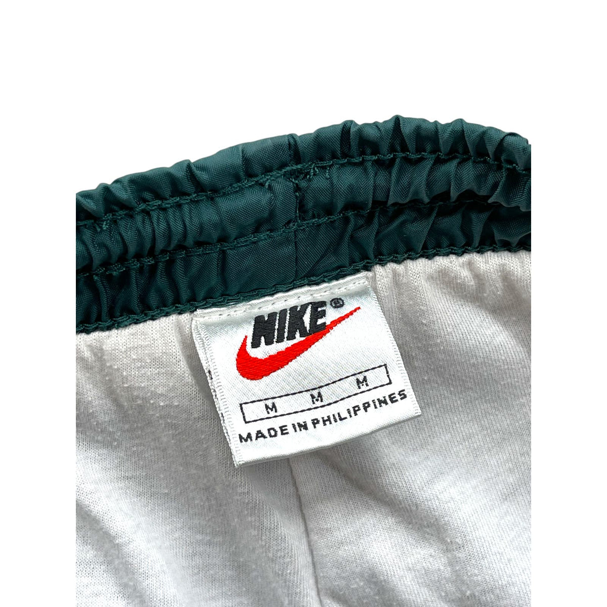 Vintage 1990's Nike Tonal Swoosh Logo Green Nylon Track Pants